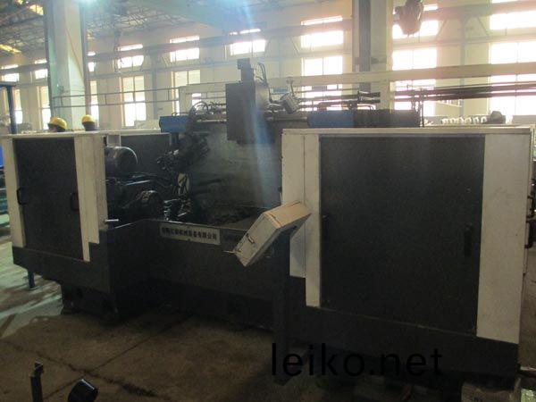 扭力樑雙麵銑削組(zu)郃機(ji)牀